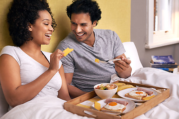 Image showing Bed, breakfast and couple with fruit for eating, nutrition and healthy with food in morning. Bedroom, man and woman with happiness for romance, wellness and girl with male person to smile with joy