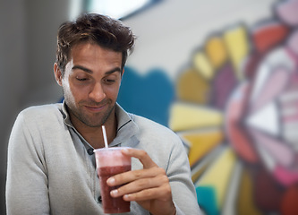 Image showing Happy, drink and smoothie for man with smile for healthy diet of strawberry, fruit and show of beverage. Male person, guy and adult relax with blended cocktail for energy, wellness and nutrition