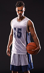 Image showing Man, portrait and basketball player in studio for fitness, competition and training on black background. Professional athlete, career and exercise with ball for game, hobby and healthy model in sport