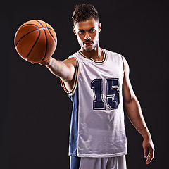 Image showing Man, portrait and basketball player in studio for sport, competition and training on black background. Professional athlete, career and exercise with ball for game, hobby and healthy model in fitness