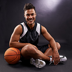 Image showing Man, portrait and basketball player with smile for sports performance, competition or black background. Male person, face and healthy wellness with pride for training workout, studio or mockup space
