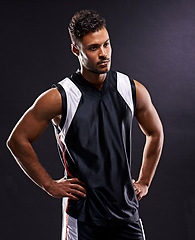Image showing Man, athlete and thinking confidence in studio as basketball player or professional workout, pride or black background. Male person, thoughts and exercise training or sport game, fitness or mockup