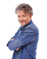 Image showing Portrait, confidence and smile of mature man in studio isolated on a white background. Face, fashion or person with arms crossed in casual clothes or denim jacket for pride on a backdrop in Australia