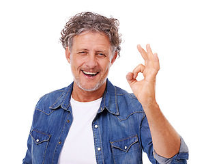 Image showing Senior man, portrait and OK hand gesture, feedback or opinion with success, like emoji and agreement on white background. Yes, vote and review with smile, choice or decision for motivation in studio