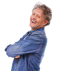 Image showing Portrait, confidence and happy mature man laughing in studio isolated on a white background. Arms crossed, funny and face of person in casual clothes or denim jacket for fashion on backdrop in Canada