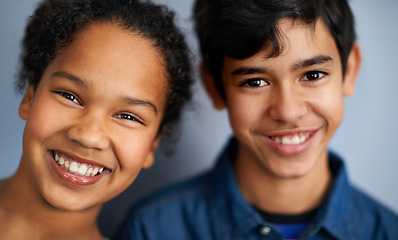 Image showing Happy family, siblings or portrait in studio, closeup and bonding together with care in childhood. Brother, sister and teenagers with smile face, friends and support for warm affection or respect