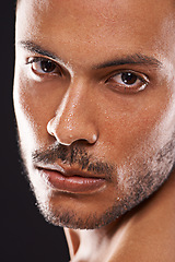 Image showing Portrait, skincare and man in studio closeup for wellness, dermatology or skin cleaning on black background. Face, water and male model with masculine beauty, cosmetics or facial splash treatment