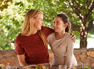 Image showing Family, lunch and hug with mother, girl and outdoor with sunshine and happiness with healthy meal. Nature, mama and daughter with food and event with celebration and embrace with summer and smile