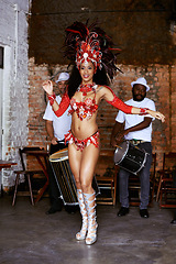Image showing Women, samba dancer and happy at carnival, stage and band with fashion, culture and creativity in nightclub. Girl, people and dancing with music, drums and tradition for celebration in Rio de Janeiro