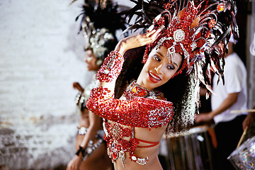 Image showing Women, smile and samba dancer for performance with passion, fashion and drums for music in Brazil. Female person, traditional costume and band at event with entertainment, celebration and heritage