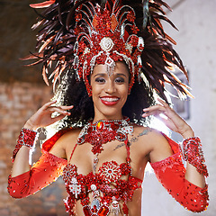 Image showing Smile, costume and carnival for Brazilian female dancer, celebration and traditional festival. Dance, portrait or samba for performance in Rio De Janeiro, culture or party for concert for Mardi Gras
