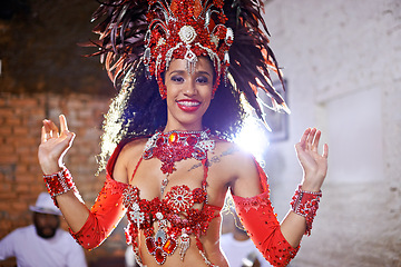 Image showing Portrait, dance and costume for Brazilian female dancer, celebration and traditional festival. Carnival, smile or samba for performance in Rio De Janeiro, culture or party for concert for Mardi Gras