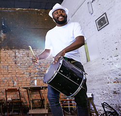 Image showing Music, carnival and drummer or performance, show and musician on stage. Concert, entertainment or fun celebration for musical artist, smile and drum for male Brazilian talent from low angle