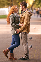 Image showing Couple, love and smile with date at park in cold weather or winter, together and support in London. Relationship, commitment and bonding for romance with soulmate, care and happiness for affection