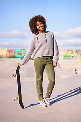 Image showing Portrait, smile and woman with skateboard on street in city in summer for sport, health and exercise outdoor. Happy person, skate park and gen z girl in casual clothes for fashion in South Africa