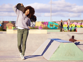 Image showing Skatepark, fashion and portrait of black woman with skateboard in city for skating, training and hobby. Skater, happiness and face of female person for trendy, edgy and hipster clothing in town