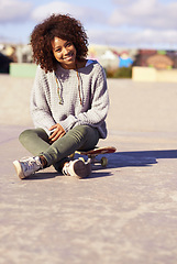 Image showing Portrait, smile and woman at skate park in city in summer for sport, hobby or relax outdoor. Happy person, skateboard and gen z girl in casual clothes for fashion on mockup space in South Africa