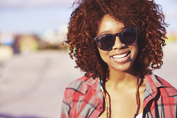 Image showing Face, black woman and smile with sunglasses at skatepark or outdoor with happiness, leisure and break in Atlanta. Closeup, female person and skater with hobby or activity for training, fun and relax