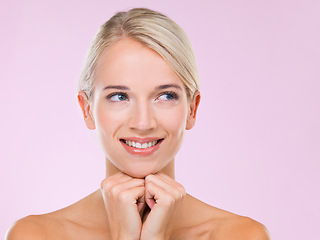 Image showing Woman, skincare and beauty in studio with smile, thinking and results for wellness with glow by pink background. Girl, person and model with cosmetics, facial skin and transformation with vision