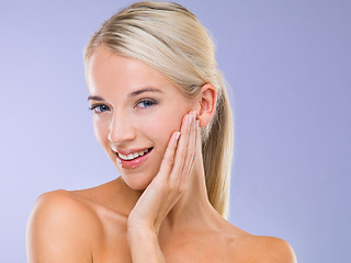 Image showing Woman, portrait and skincare treatment with hand for healthy beauty, purple background or confidence. Female person, face and smile or makeup cosmetics as dermatology wellness, studio or mockup space