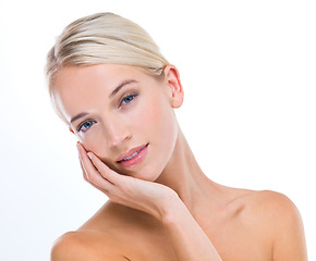 Image showing Woman, skincare and beauty in studio portrait with hand of face for results, wellness and glow by white background. Girl, person and model with cosmetics, facial skin and transformation with pride