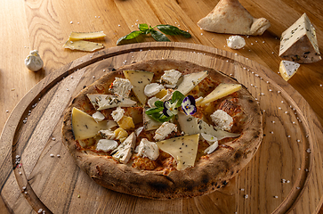 Image showing Artisan pizza with a variety of cheeses