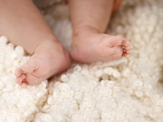 Image showing Feet, comfort and rest for sleeping baby, tired or peaceful kid and nurture in blanket for relaxing in nursery. Child development, barefoot newborn or health, childcare and family home with growth