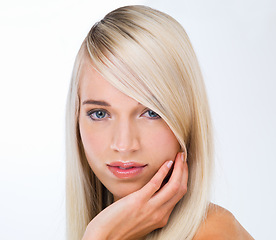 Image showing Blonde woman, hair care and studio portrait with beauty, wellness and results by white background. Girl, person and model with hairstyle, transformation and change with natural glow for health