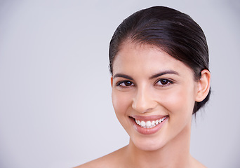 Image showing Beauty, face and happy with woman in portrait, clean and natural with cosmetic care and wellness on grey background. Facial, treatment and skincare for dermatology, healthy skin glow and shine