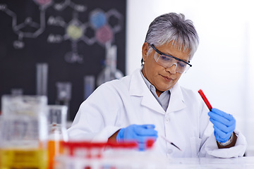 Image showing Science, blood sample and senior woman in laboratory for medical analysis, research and study. Healthcare, biotechnology and scientist with test tube for vaccine development, experiment and medicine