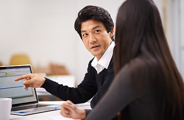 Image showing People, help and learning to work with laptop in Japanese business with teamwork and mentor with feedback. Project, site and man explain process on computer to person with support in training