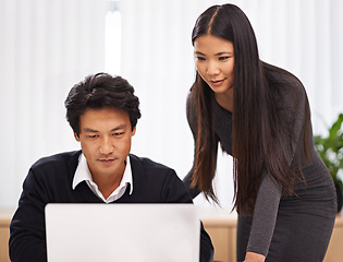 Image showing Teamwork, mentor and help with laptop in office or businessman learning from support of woman. Feedback, advice and manager training asian man on computer in collaboration and reading online research