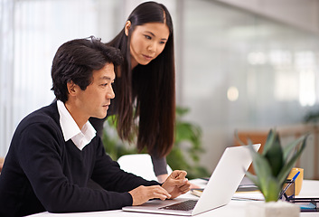 Image showing Mentor, help and laptop in office with teamwork or businessman learning from support of woman. Feedback, advice and manager training asian man on computer in collaboration and reading online research