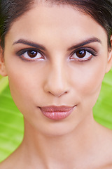 Image showing Face closeup, woman and beauty with palm leaf background, makeup and natural skincare with dermatology. Organic, nature and eco cosmetics in portrait, clean with wellness and sustainable treatment