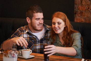 Image showing Couple, happiness and lunch on date at cafe for bonding, drinks and healthy relationship with relax. Man, woman and romance at coffee shop with smile, beverage and anniversary vacation in New York