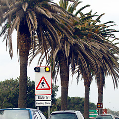 Image showing Road sign, pedestrian and warning in traffic in city with mistake with grammar, joke and comic text for walking. Cars, error and funny signage with graphic, language or wrong information in Cape Town