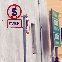 Image showing Signage for road and city with information, outdoor and board with urban town and design. Direction, icon and street with symbol and buildings with poster and language with warning, day and board