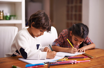 Image showing Education, remote learning and siblings in a kitchen with book, writing or homework assignment in their home. Notebook, homeschool and children studying in a house with help, support or art lesson