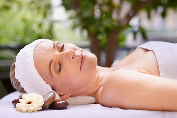 Image showing Happy woman, sleeping and relaxation with zen for skincare, stress relief or peace at spa, hotel or resort. Calm female person asleep in relax for facial, beauty or body treatment at outdoor salon