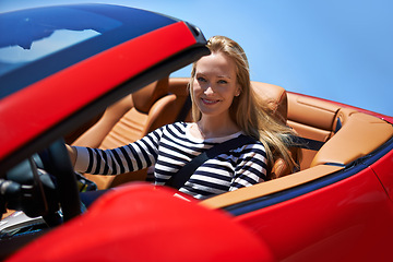 Image showing Woman, portrait and happy in sports car for adventure in summer or road trip on vacation in Beverly Hills. Luxury vehicle for speed on highway, transport and drive on mountain for journey or freedom