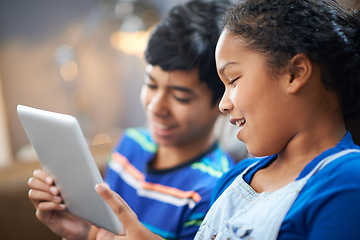 Image showing Siblings, tablet and happy with smile on couch, family home and technology for streaming and playing entertainment. Internet, children together and elearning for child development or online games