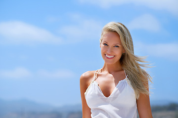Image showing Portrait, sky or happy woman at a beach to relax on vacation for break at sea in Athens, Greece. Tourist, ocean or person in summer fashion or clothes to travel with smile, wellness or confidence