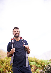 Image showing Man, hike and happy for adventure with backpacker for fitness, workout and hobby on mountain top in countryside. Explore, smile and outdoor activity in nature for healthy mind in woods on holiday