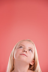 Image showing Child, thinking and girl in studio for idea and wonder for adorable and growing up for adolescent and innocent. Young person or kid and looking for junior, childhood and children for cute on mockup