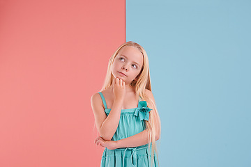 Image showing Question, ideas and girl child in studio with brainstorming facial expression by mockup space. Planning, thinking and young kid model with guess, decision or choice face by color block background.