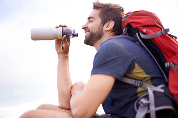 Image showing Man, hiking and break for water, health and wellness with bottle and mountain. Athlete, exercise and adventure with summer, sunshine and backpack journey on cape town trail with travel and vacation