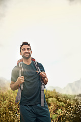 Image showing Man, hike and happiness for adventure with backpacker for fitness, workout and explore on mountain top. Lens flare, smile and outdoor in nature for healthy mind in woods on holiday in New Zealand