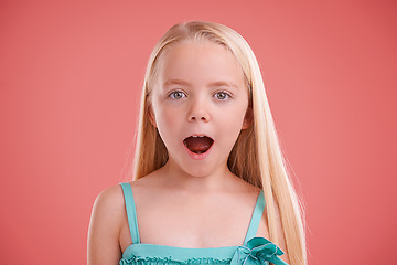 Image showing Surprise, portrait and girl with expression for wow, shock and omg in childhood isolated in studio background. Female child, gen z kid and face or mouth open for silly, amazed and announcement