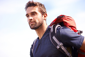 Image showing Man, hike and backpack for recreation in environment for nature and outdoor for fitness in summer. Young person and look with bag for active, walk and adventure for exercise and sport for trail