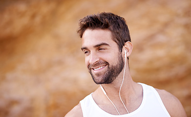 Image showing Fitness, smile and man with headphones for workout, training and music playlist for exercise. Male person, earphones and face with thinking for audio streaming, wellness or podcast for morning cardio